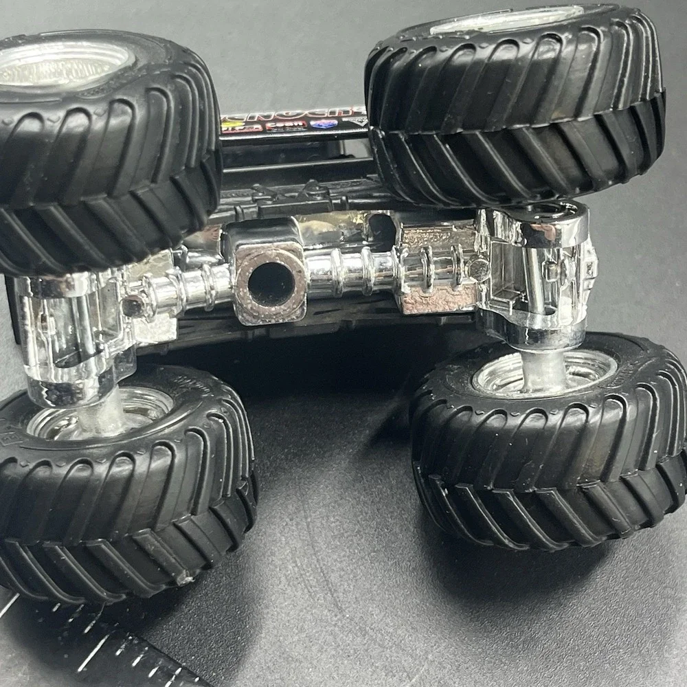1957 Chevy 1:64‎ Avenger Hot Wheels Monster Truck Black W/White Flames